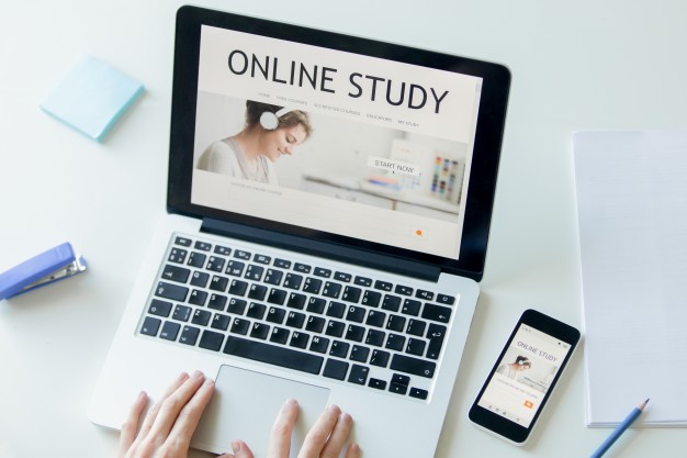 hands-working-with-a-laptop-title-online-study-on-screen_1163-2116